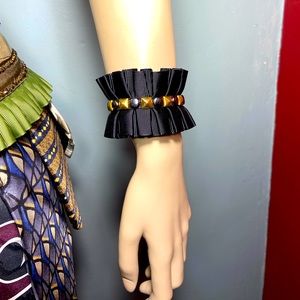 Xanadu Designs, One of a kind,Handmade, Ruffle with stud trim,sexy wrist cuff.